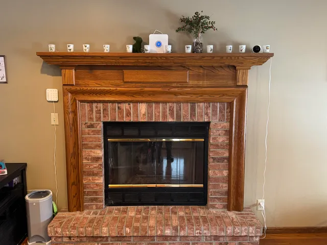 a fireplace with a clock on it