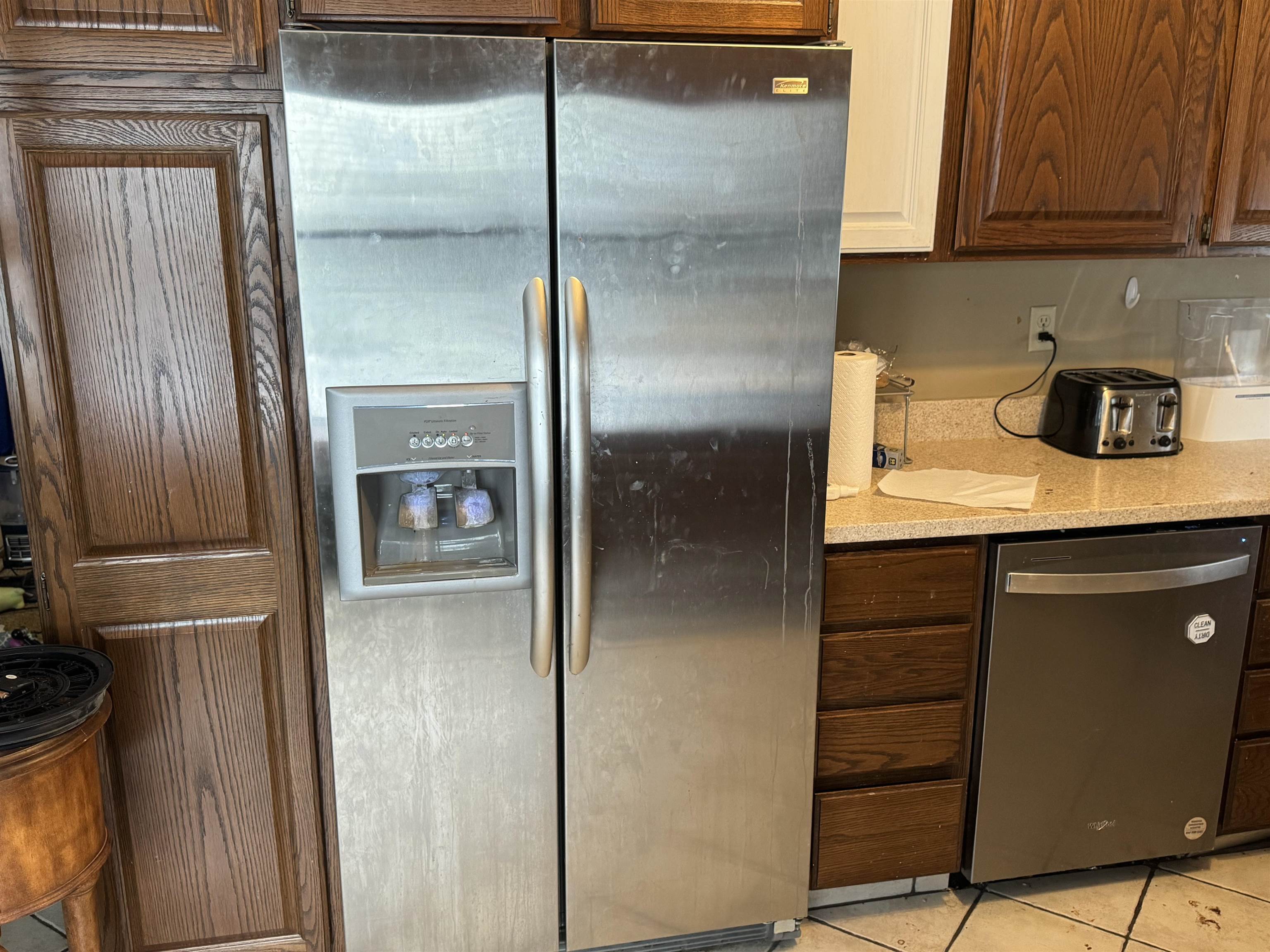 1401 Carrie Avenue Rochelle, IL 61068 - Photo 4 of 13 a kitchen with a refrigerator and cabinets