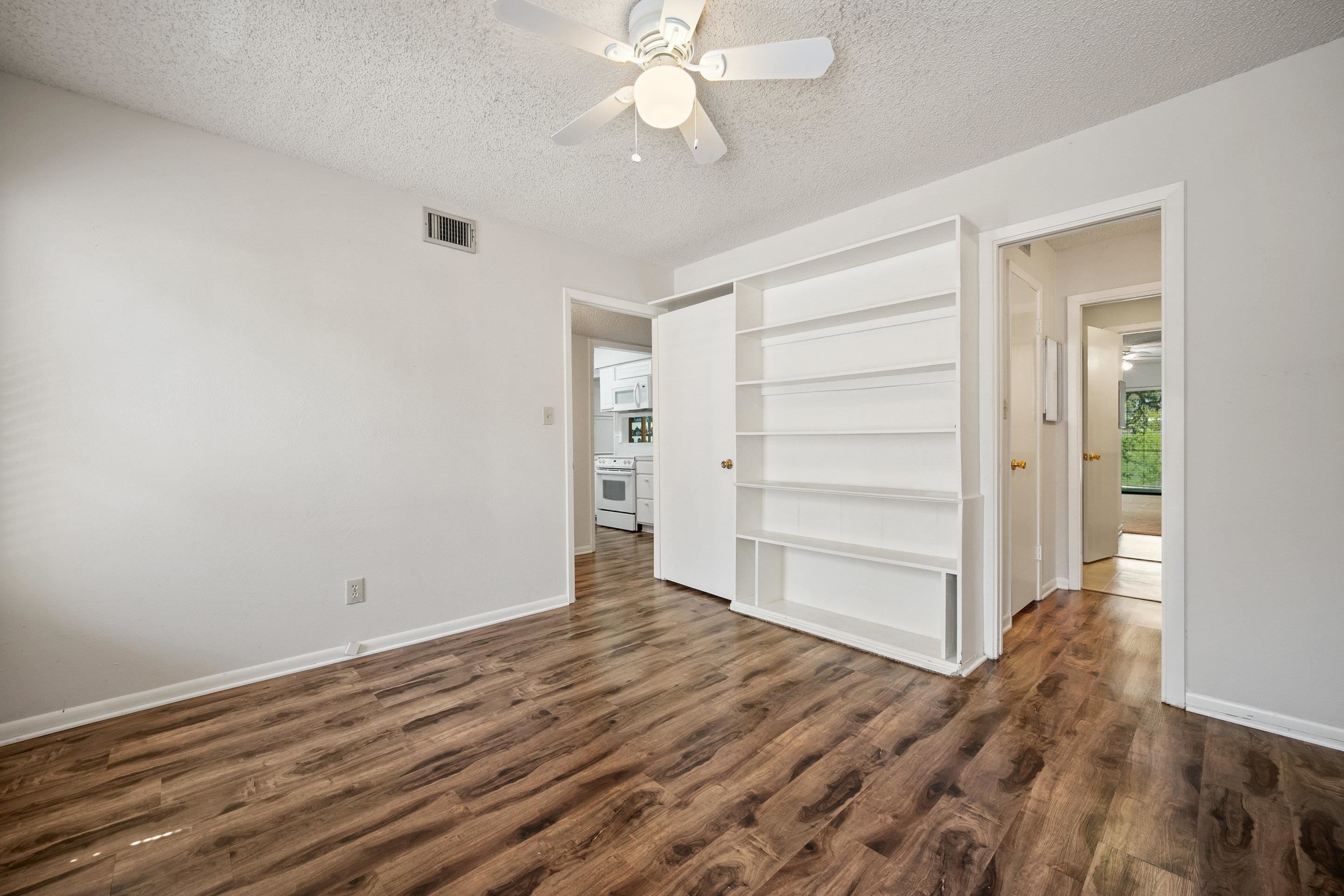 1201 Ranch Road 1431, Unit 2 Marble Falls, TX 78654 - Photo 17 of 26 wooden floor in an empty room
