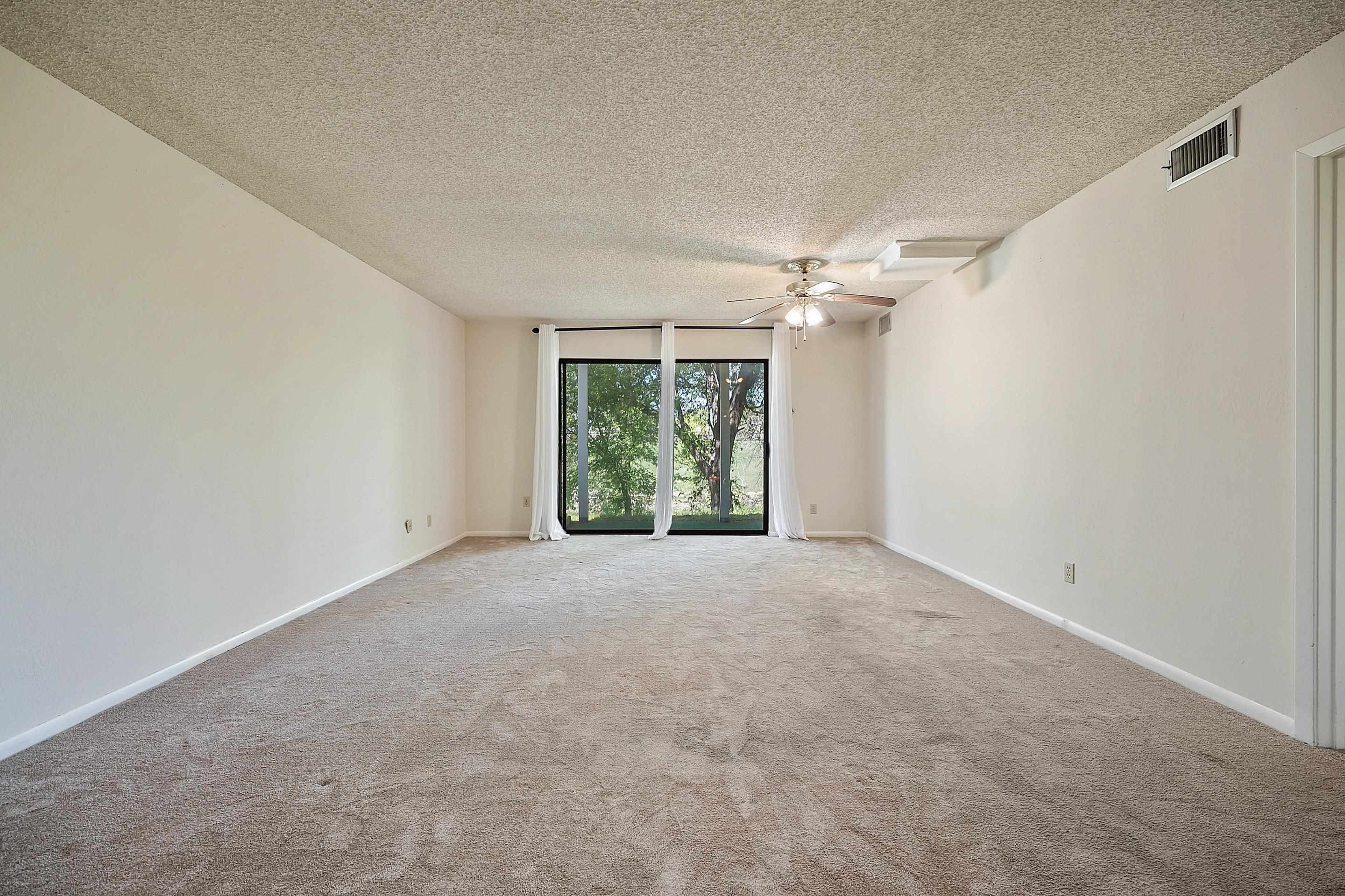 1201 Ranch Road 1431, Unit 2 Marble Falls, TX 78654 - Photo 7 of 26 a view of an empty room with a window