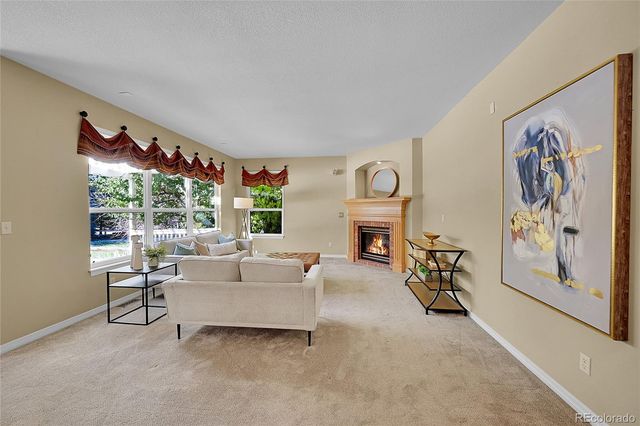 a room with furniture and a window