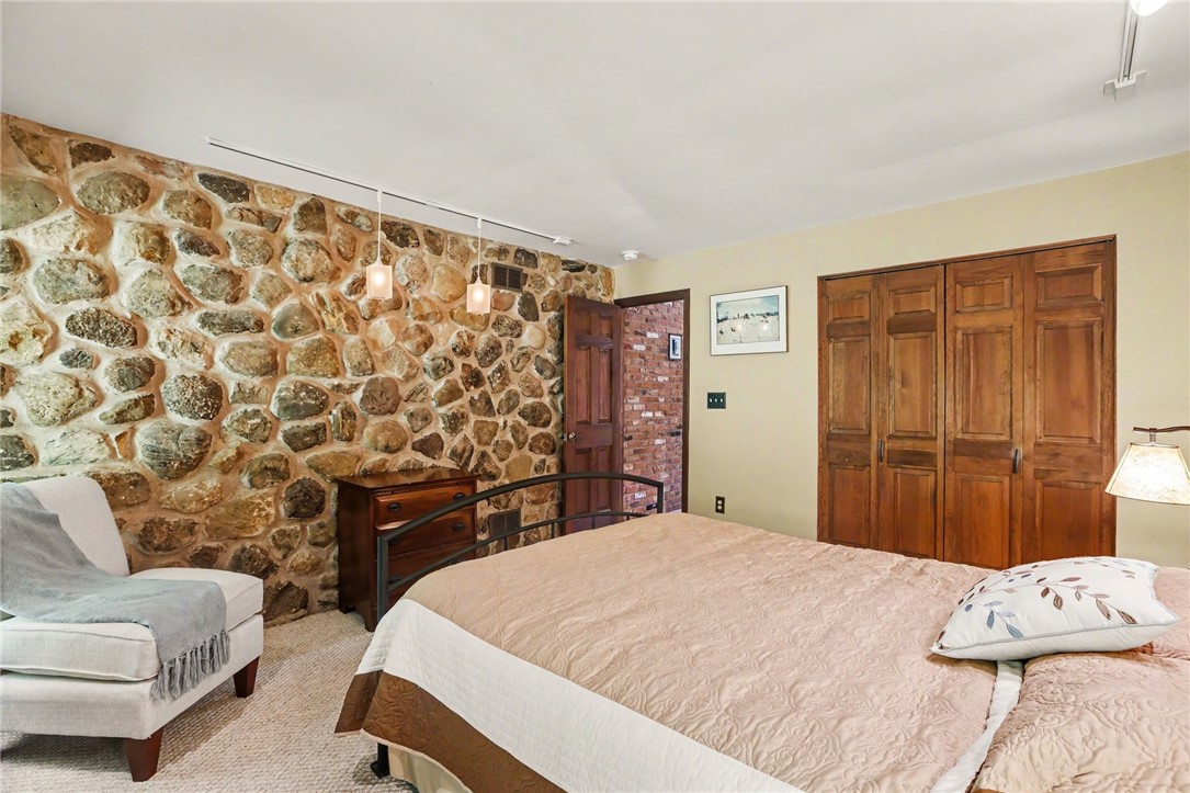 1722 Strong Road Victor, NY 14564 - Photo 12 of 33 2nd bedroom with wall to wall carpet, stone accent