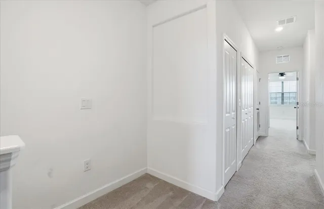 an aerial view of a house with a ocean view