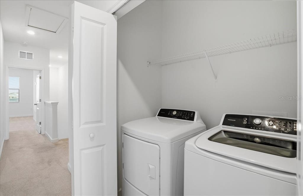 14740 Lyla Terrace Lakewood Ranch, FL 34211 - Photo 23 of 68 a utility room with dryer and washer