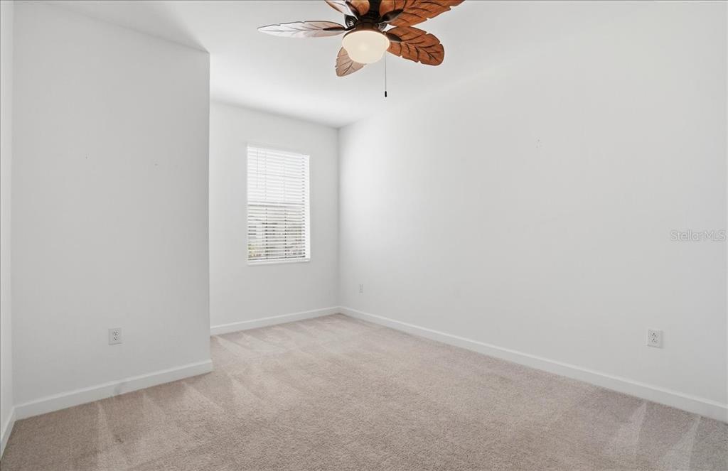 14740 Lyla Terrace Lakewood Ranch, FL 34211 - Photo 26 of 68 a view of an empty room with a window