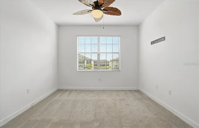 a view of backyard with outdoor space and car