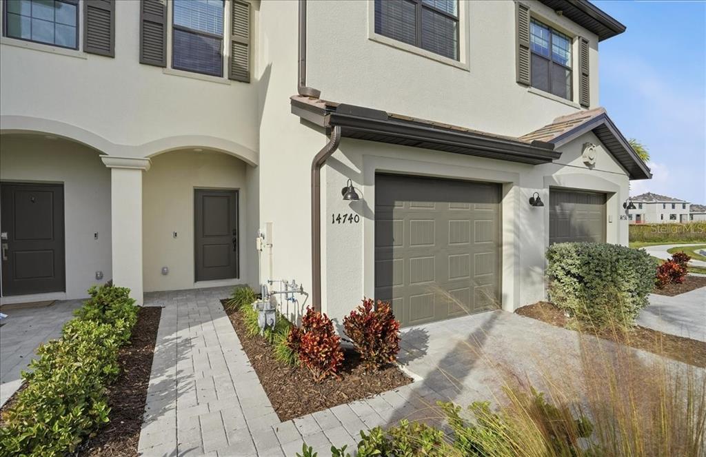 14740 Lyla Terrace Lakewood Ranch, FL 34211 - Photo 34 of 68 a front view of a house with a yard