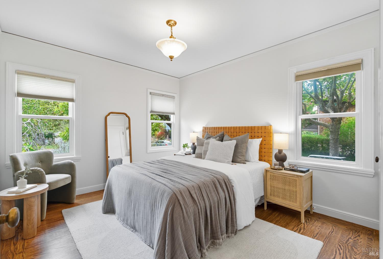 135 H Street San Rafael, CA 94901 - Photo 8 of 21 a bedroom with a bed and a large window