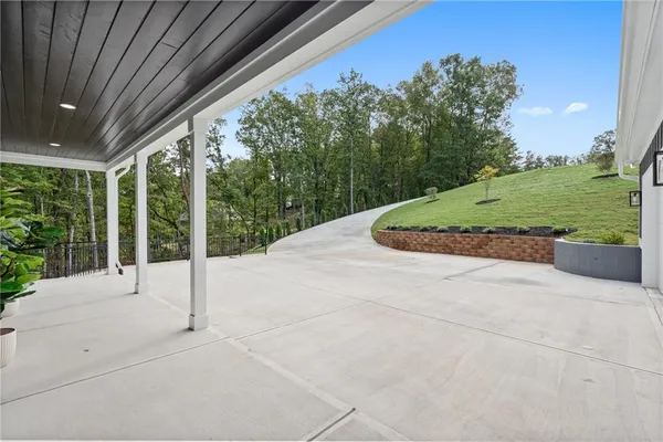 a backyard of a house with lots of green space