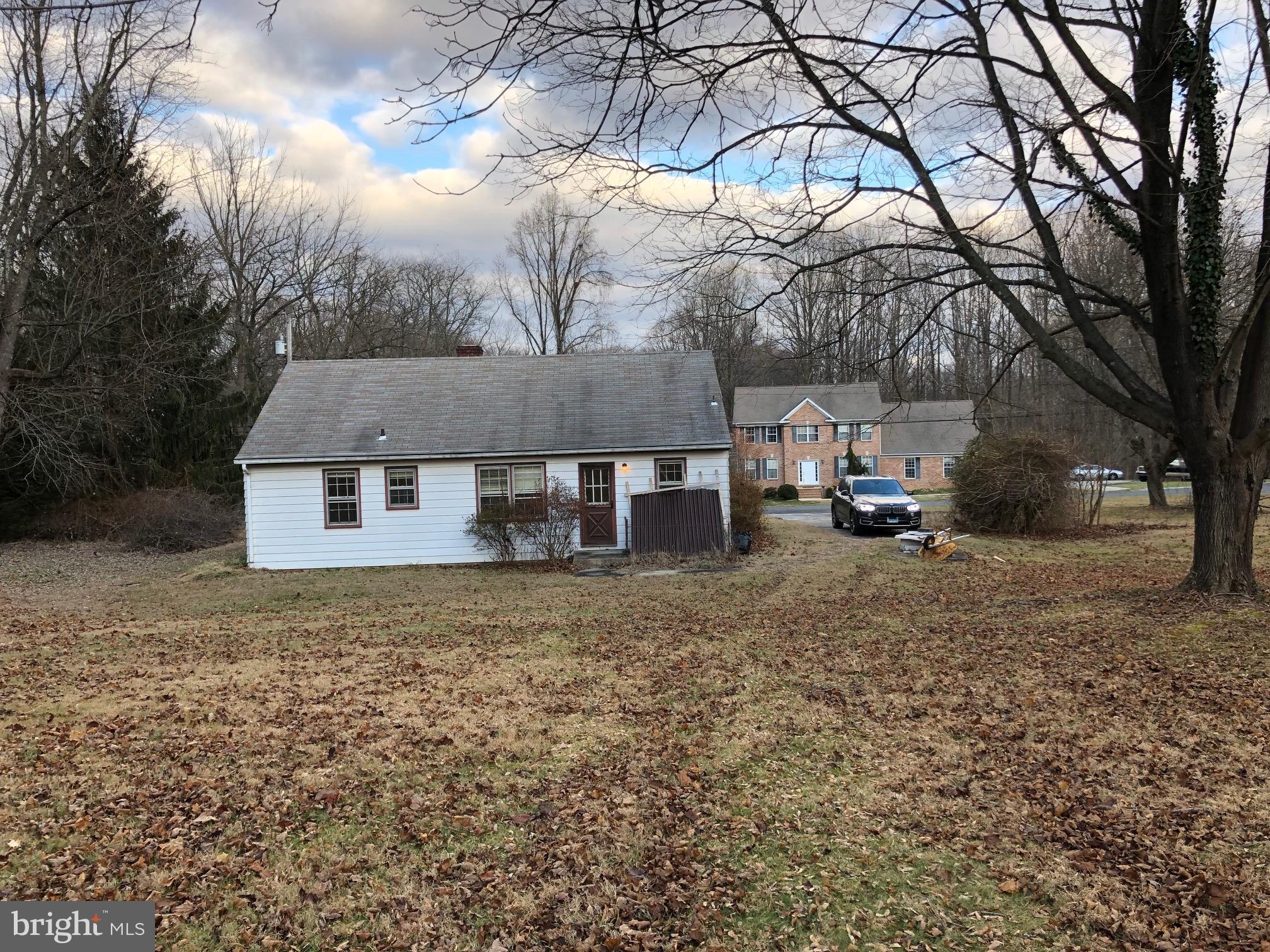 14506 Misty Valley Road Phoenix, MD 21131 - Photo 3 of 10 Back of house & backyard, looking across street