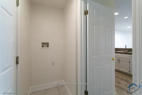 a room with a closet and a stove
