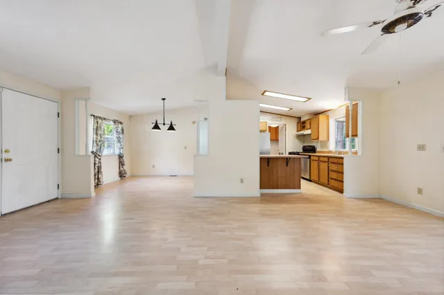 a view of a kitchen with a sink and a kitchen