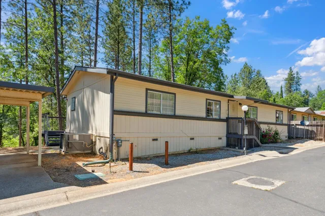 a view of a house with a street