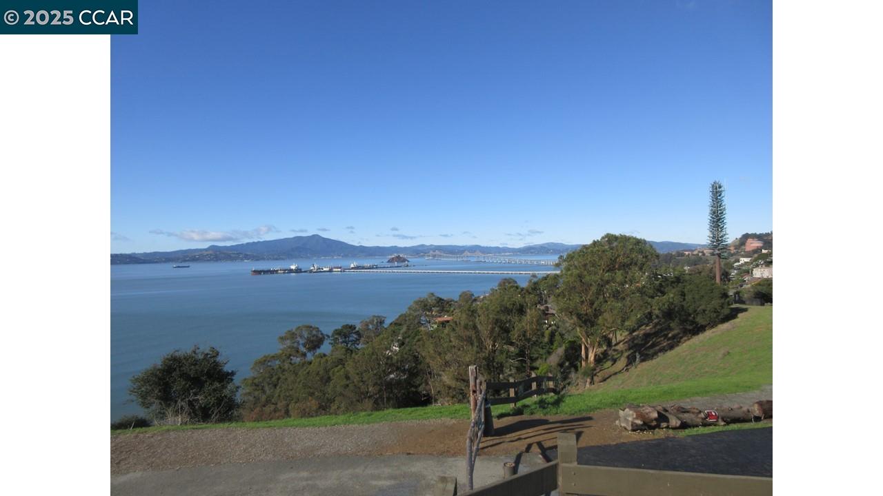 0 Crest Avenue Richmond, CA 94801 - Photo 7 of 30 a view of a lake with a mountain in the background