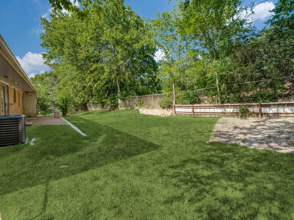 12 Geraldine Lane Denison, TX 75020 - Photo 12 of 12 a view of a backyard with large trees