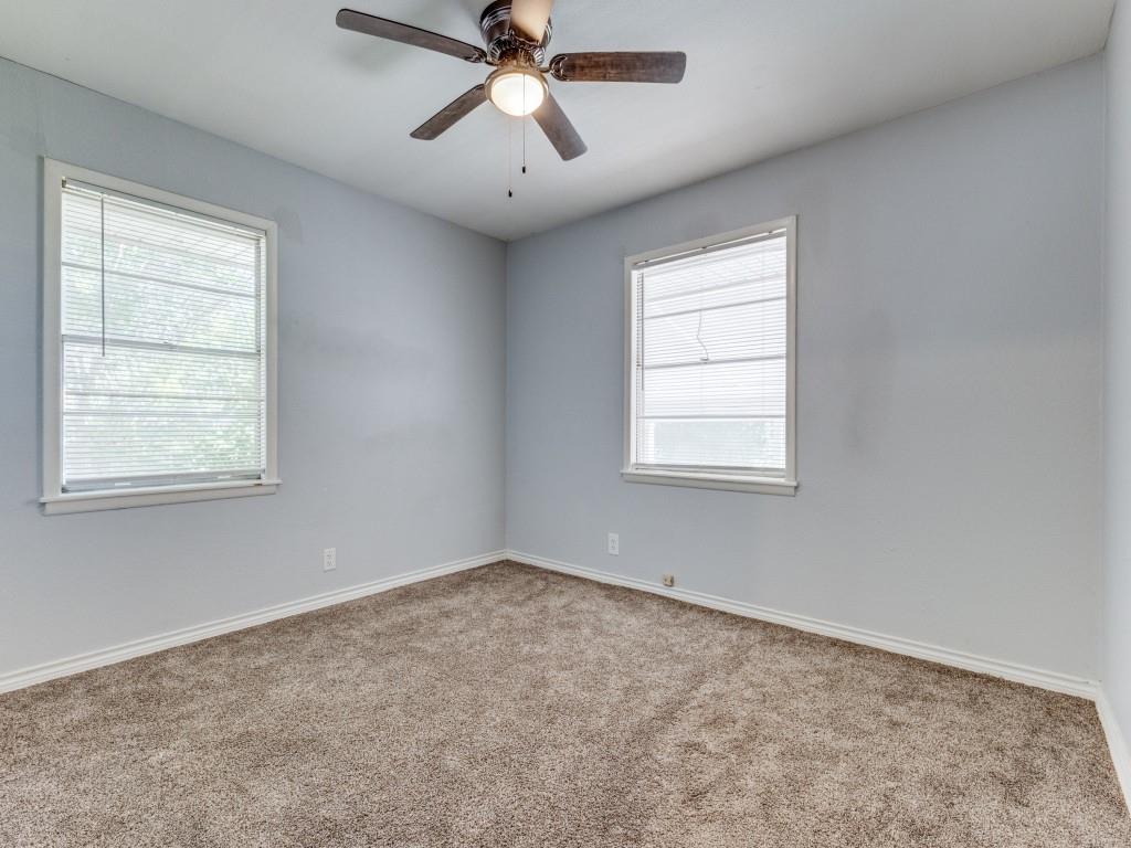 12 Geraldine Lane Denison, TX 75020 - Photo 7 of 12 an empty room with a window and a fan