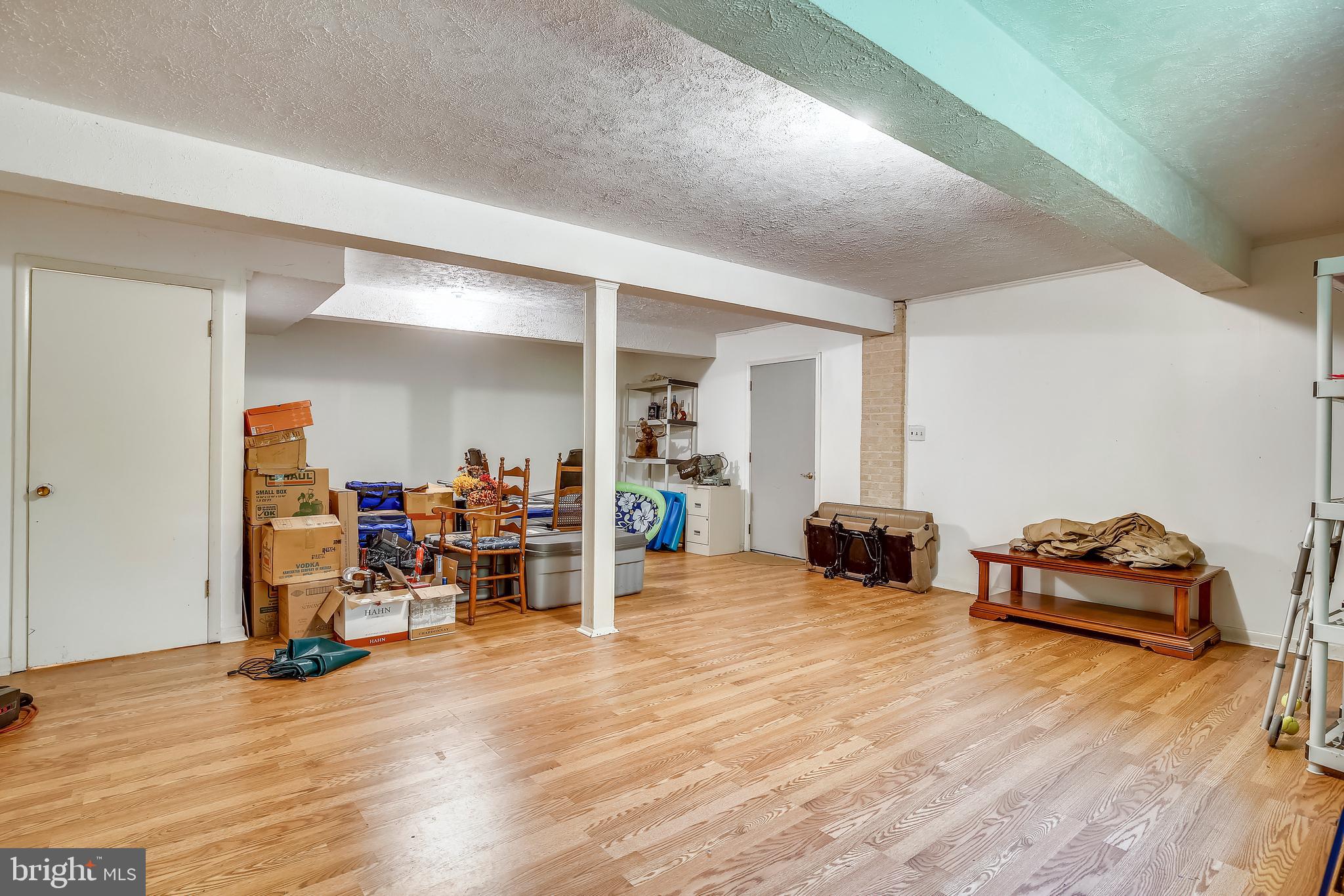 10614 Hunters Valley Road Vienna, VA 22181 - Photo 26 of 37 Large Great Room in Lower Level.