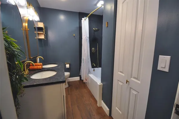 a bathroom with a sink and mirror