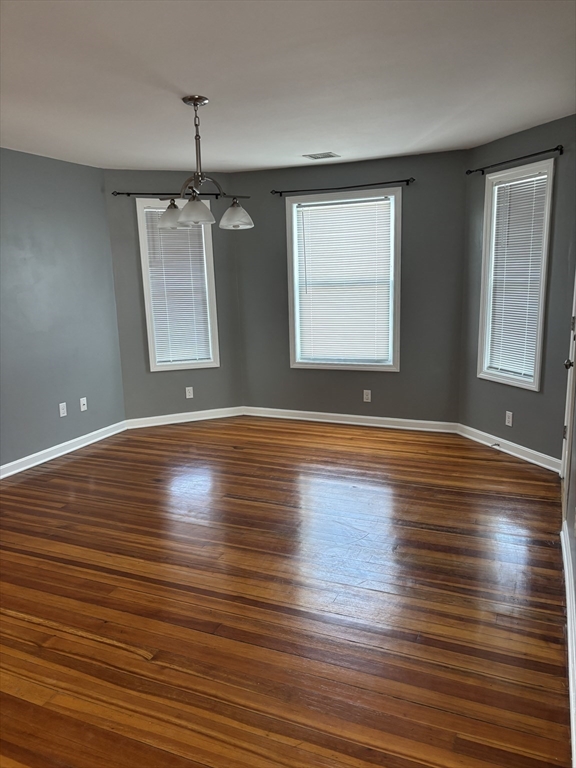 22 Huard Street, Unit 3 Fall River, MA 02721 - Photo 1 of 1 a view of room window and wooden floor