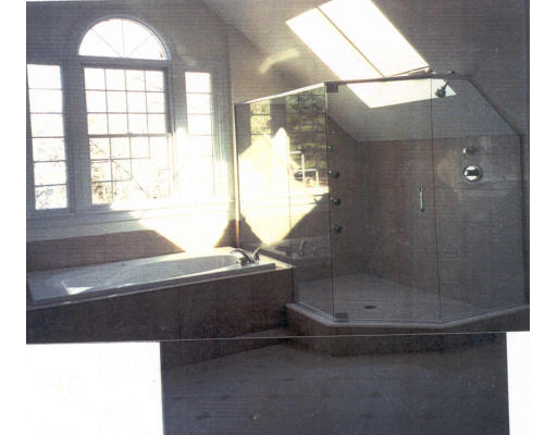 182 Concord Road Wayland, MA 01778 - Photo 7 of 11 a bathroom with a bathtub and a shower