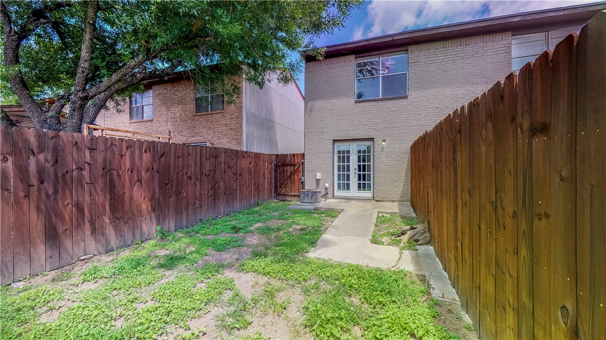 2912 Prairie Flower Circle, Unit D Bryan, TX 77802 - Photo 18 of 22 a front view of a house with a yard