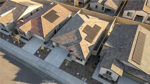 an aerial view of a house with lots of windows