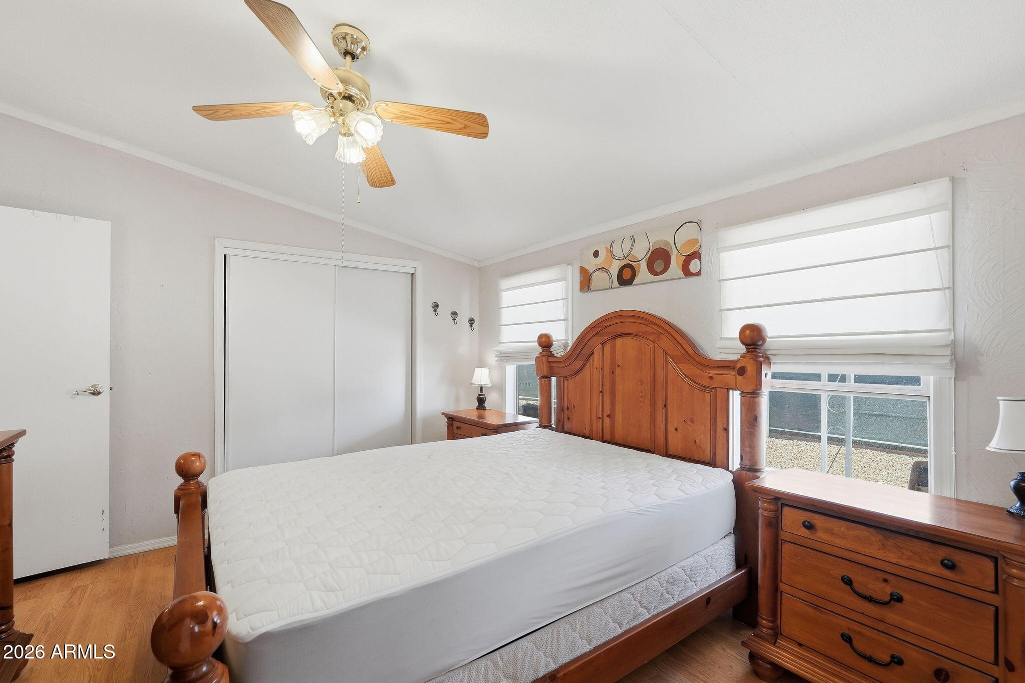 53 North Mountain Road, Unit 38 Apache Junction, AZ 85120 - Photo 20 of 35 a bedroom with a bed and a window