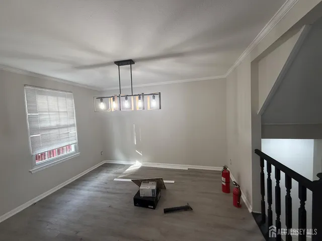 a room with furniture and window