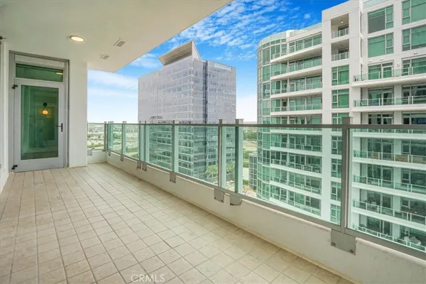 a spacious bathroom with a double vanity sink mirror and toilet