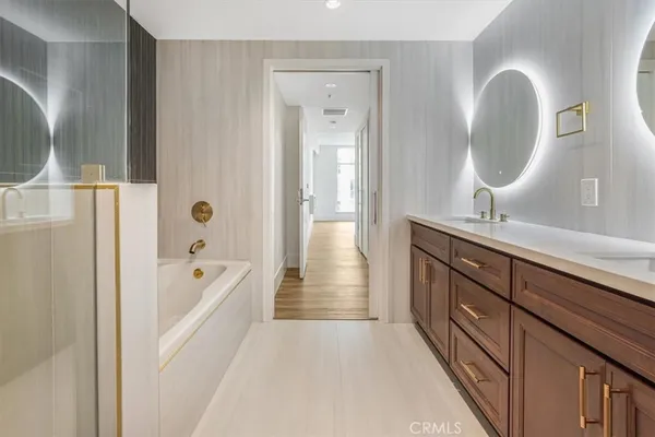 a view of a hallway with wooden shelves