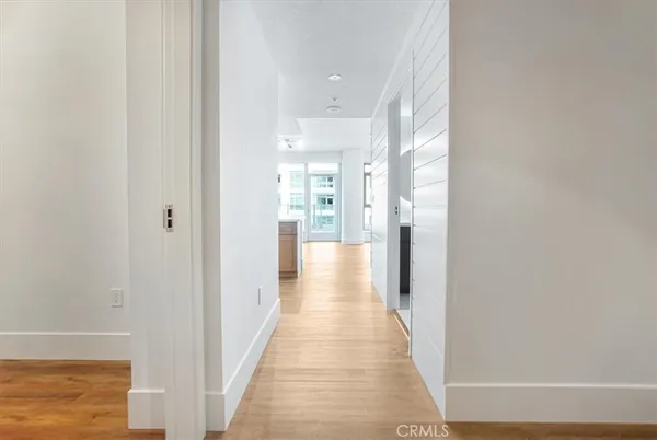 a view of a livingroom with furniture and a flat screen tv