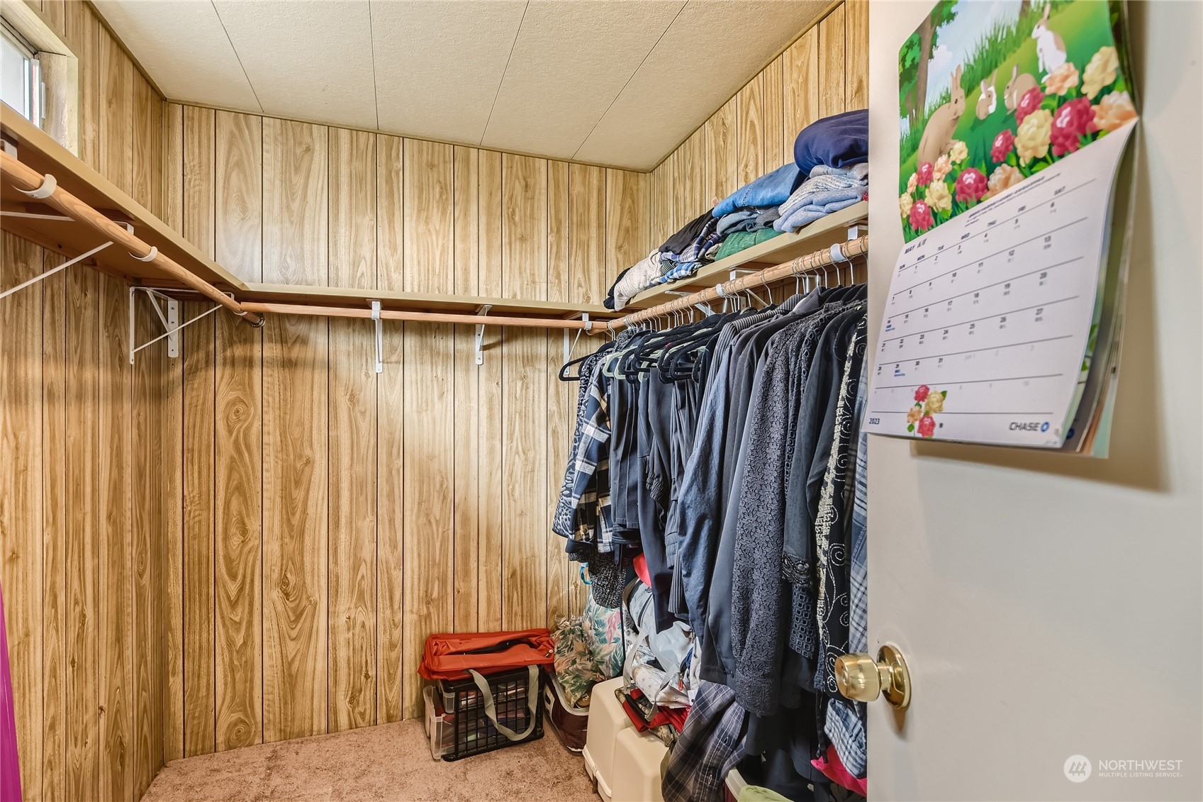 1121 244th Street Southwest, Unit 50 Bothell, WA 98021 - Photo 11 of 22 a view of walk in closet with clothes
