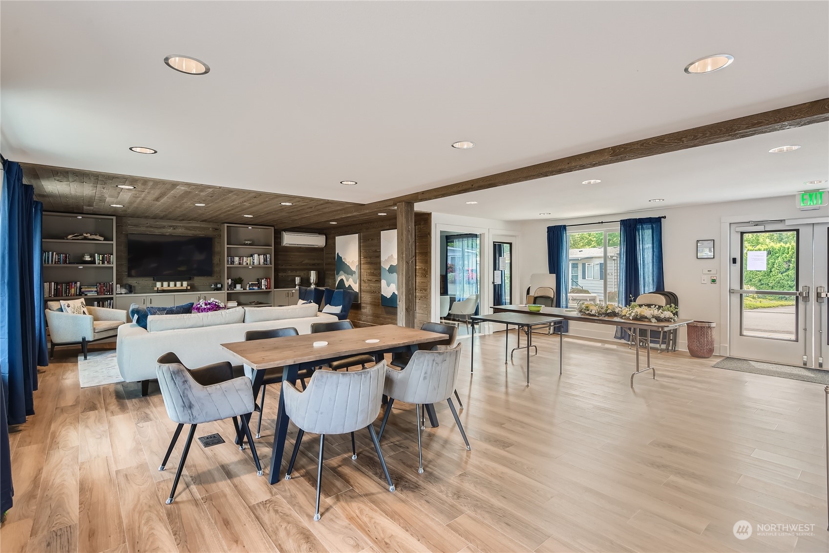 1121 244th Street Southwest, Unit 50 Bothell, WA 98021 - Photo 19 of 22 a view of a dining hall with furniture and wooden floor