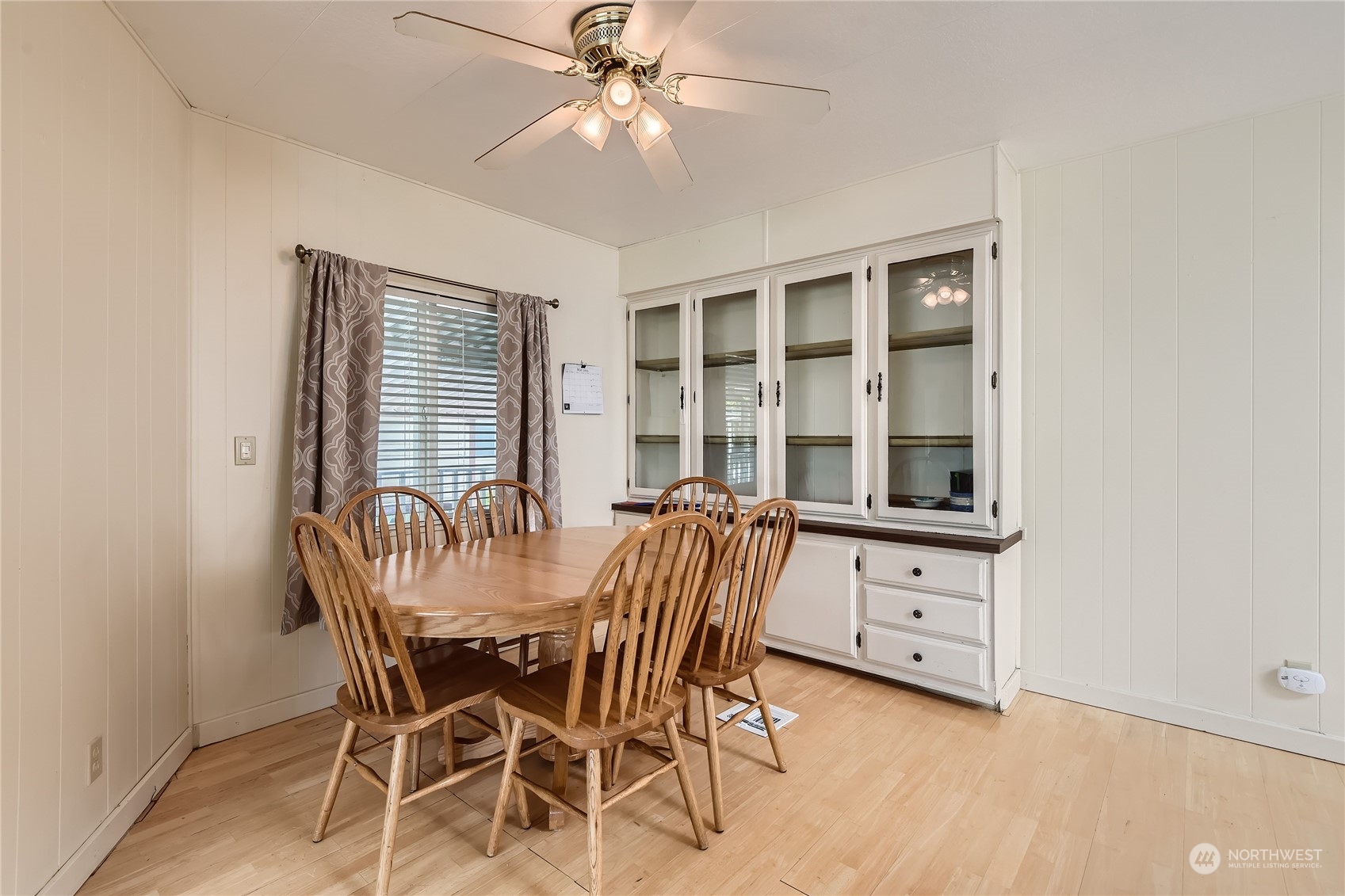 1121 244th Street Southwest, Unit 50 Bothell, WA 98021 - Photo 5 of 22 a dining room with furniture and window
