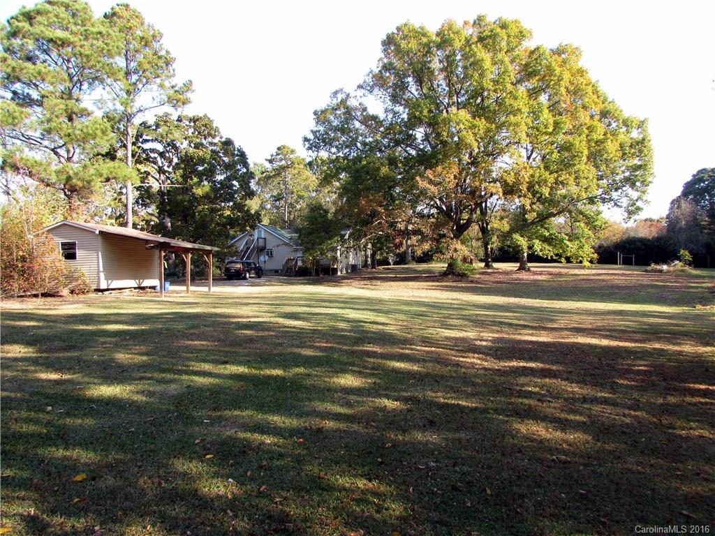 4545 Musket Hill Road Sharon, SC 29742 - Photo 2 of 20 a front view of a house with a yard