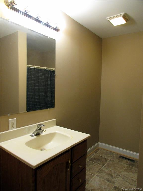 4545 Musket Hill Road Sharon, SC 29742 - Photo 19 of 20 a bathroom with a sink and a mirror
