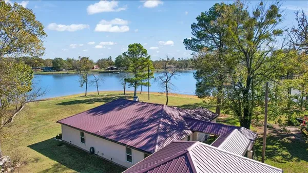 a view of a backyard with a patio