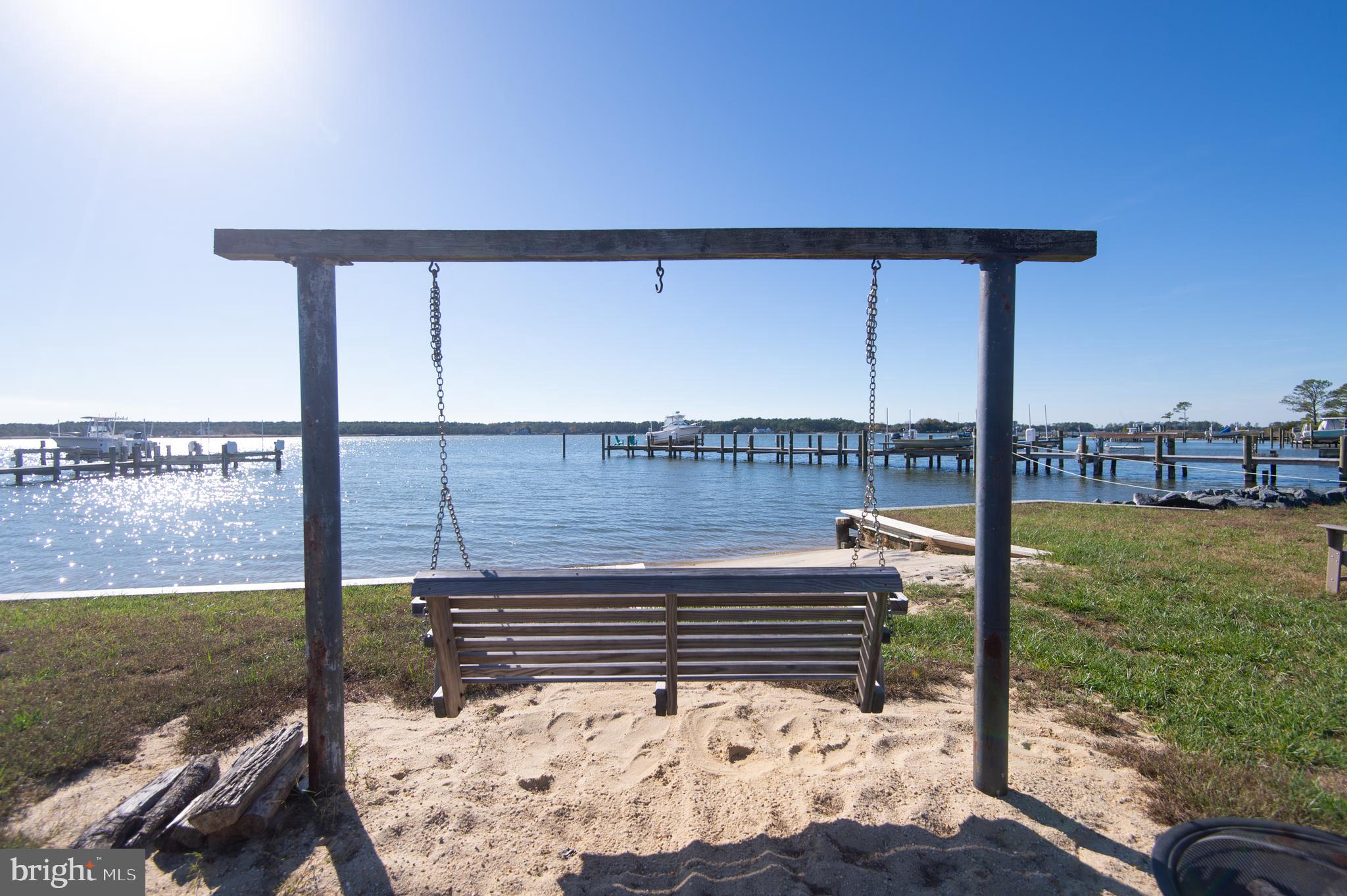 4906 David Greene Road Cambridge, MD 21613 - Photo 8 of 62 Who doesn't enjoy a swing?..and look at that view!