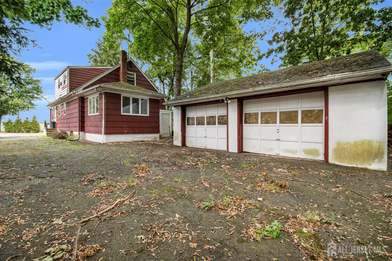 20 High Street New Providence, NJ 07974 - Photo 16 of 31 a view of a house with a yard