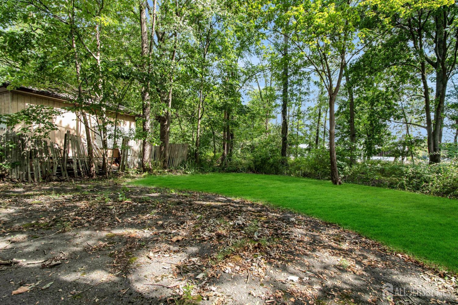 20 High Street New Providence, NJ 07974 - Photo 18 of 31 a view of a yard with tree s