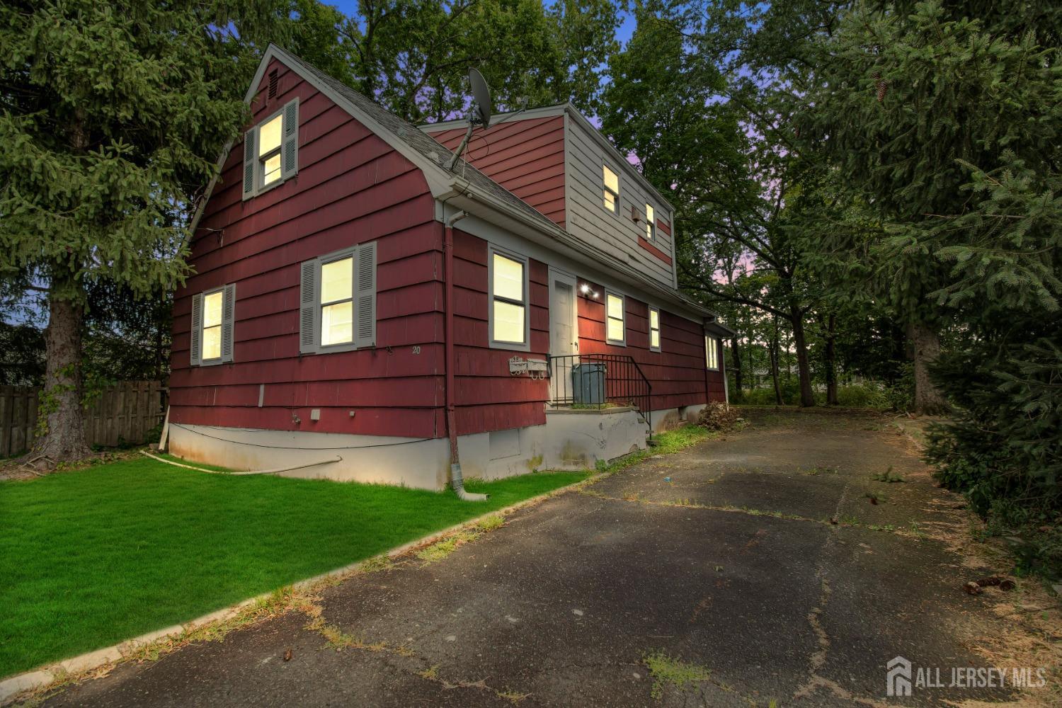 20 High Street New Providence, NJ 07974 - Photo 23 of 31 a front view of a house with a garden