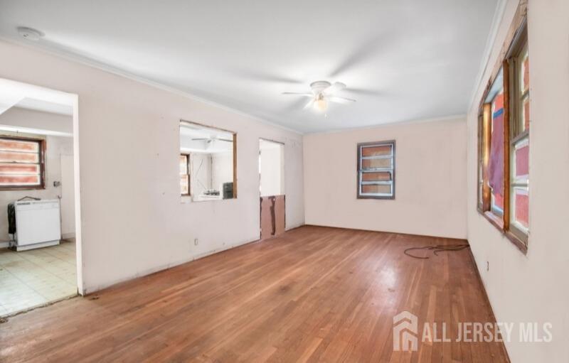 20 High Street New Providence, NJ 07974 - Photo 25 of 31 a view of an empty room window and wooden floor