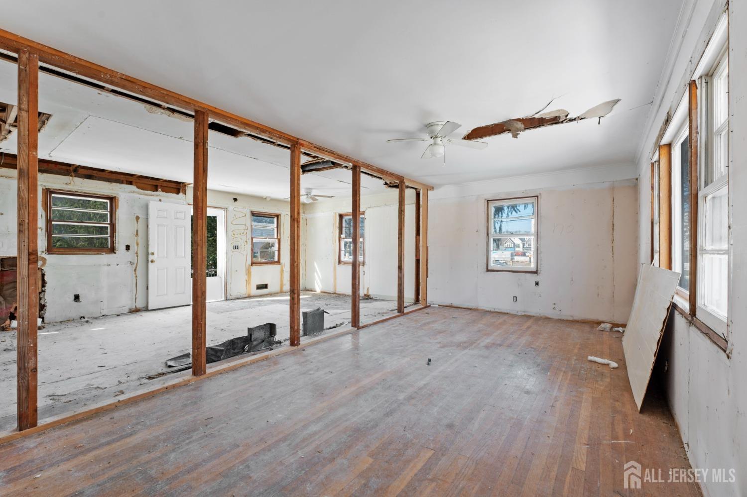 20 High Street New Providence, NJ 07974 - Photo 5 of 31 an empty room with windows