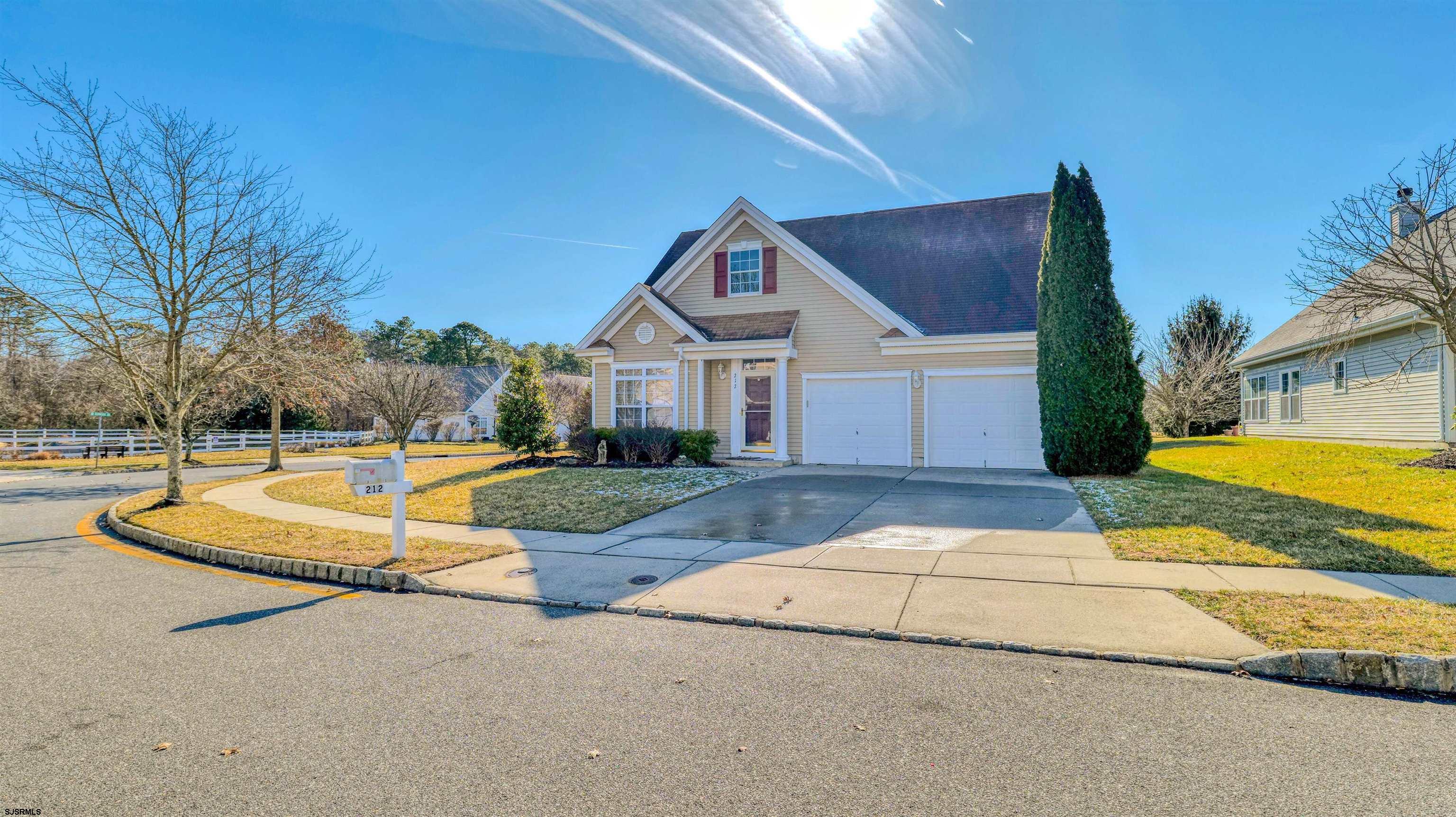 212 Lander Road Egg Harbor Township, NJ 08234 - Photo 1 of 33 a front view of a house with a yard