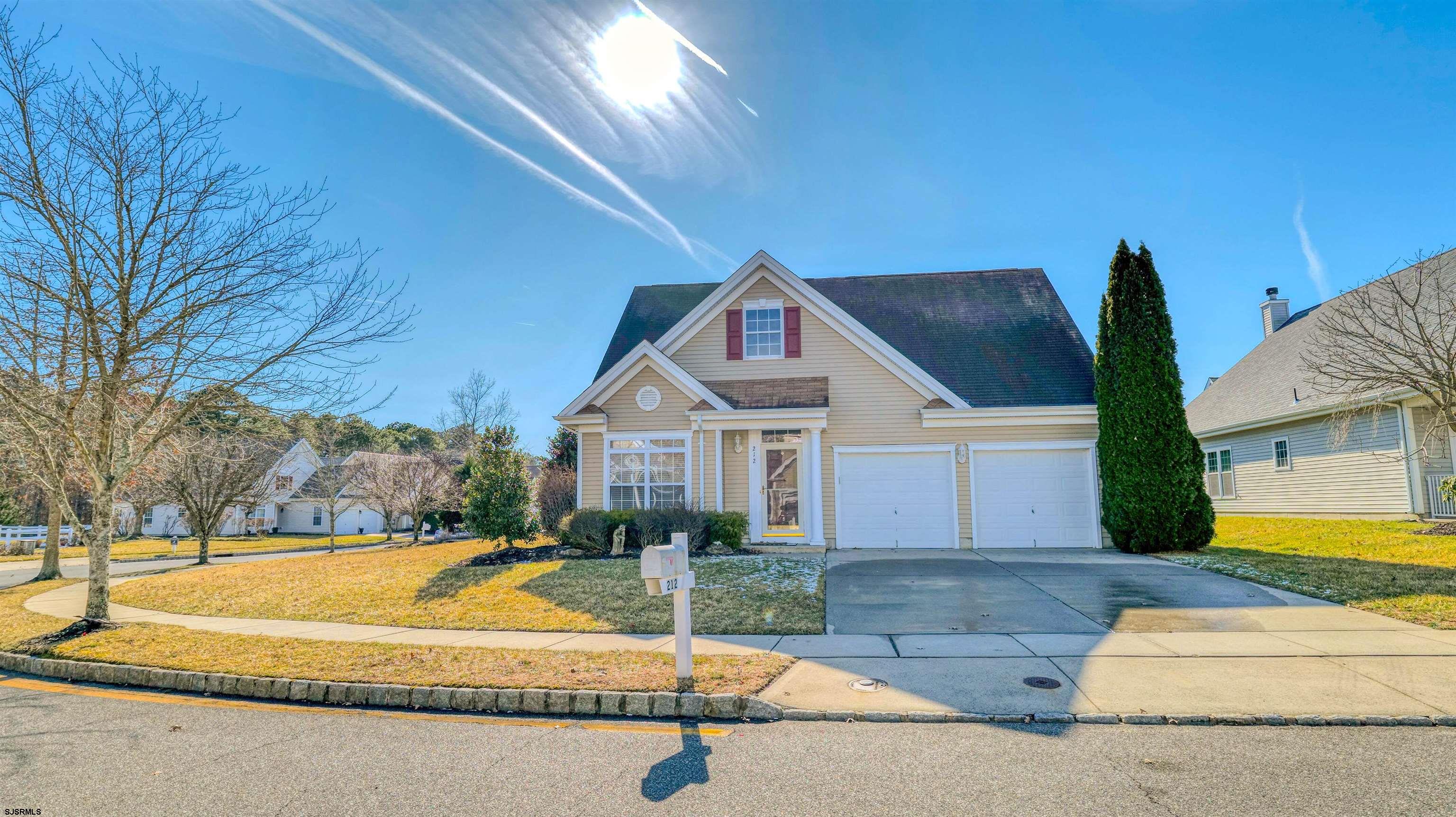 212 Lander Road Egg Harbor Township, NJ 08234 - Photo 4 of 33 a view of house with yard and palm trees
