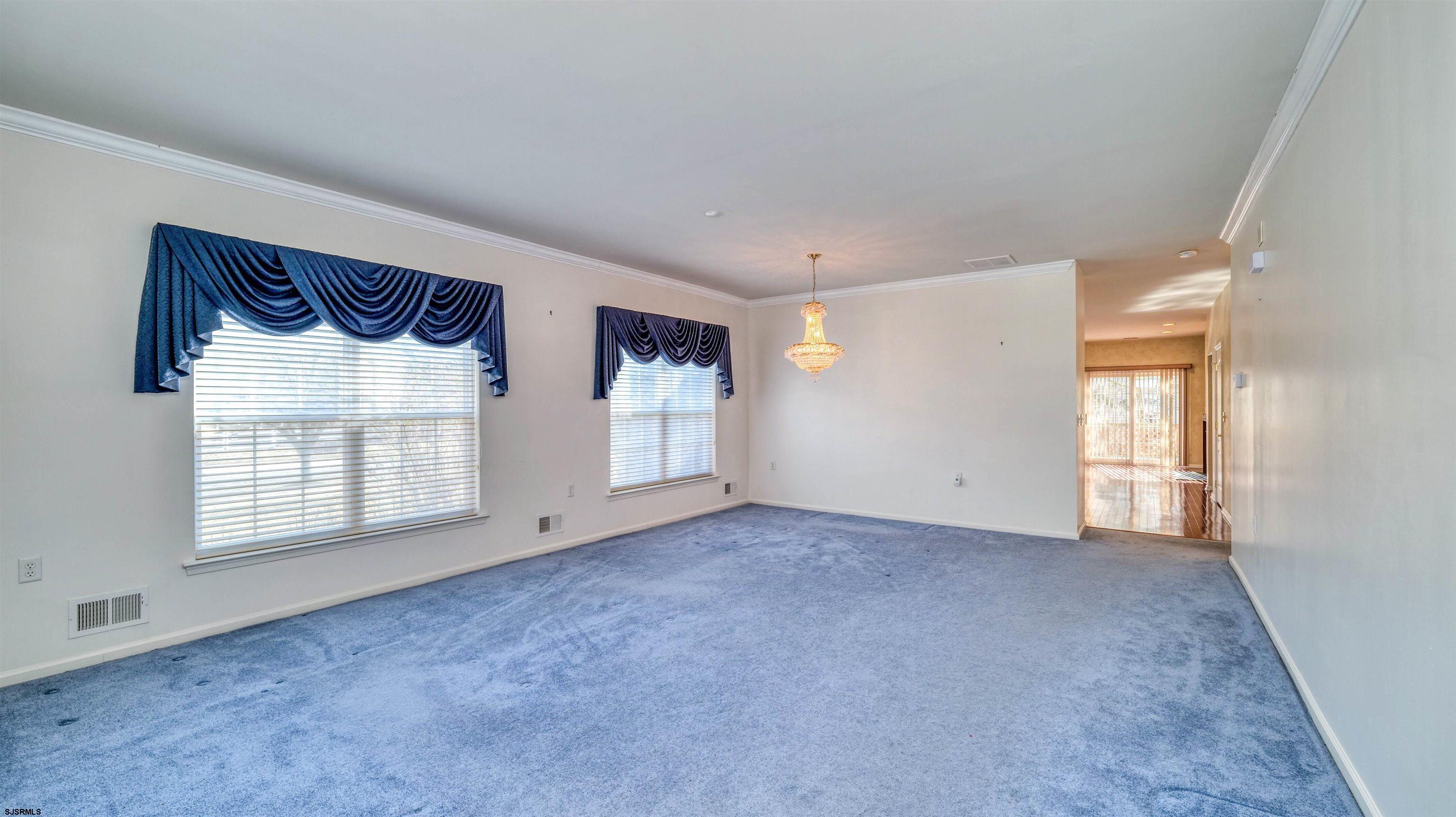 212 Lander Road Egg Harbor Township, NJ 08234 - Photo 6 of 33 an empty room with windows