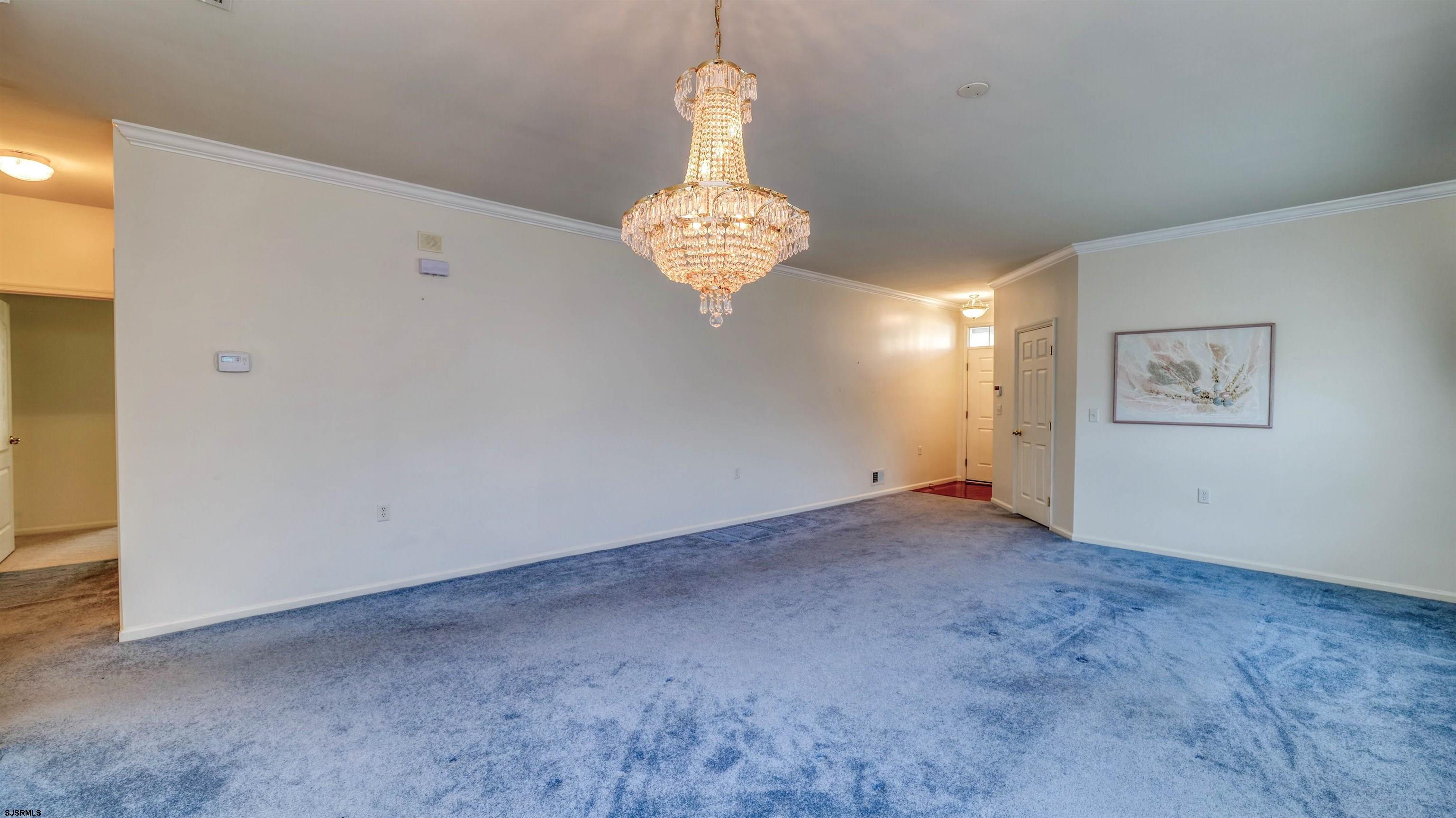 212 Lander Road Egg Harbor Township, NJ 08234 - Photo 8 of 33 a view of an empty room with a window