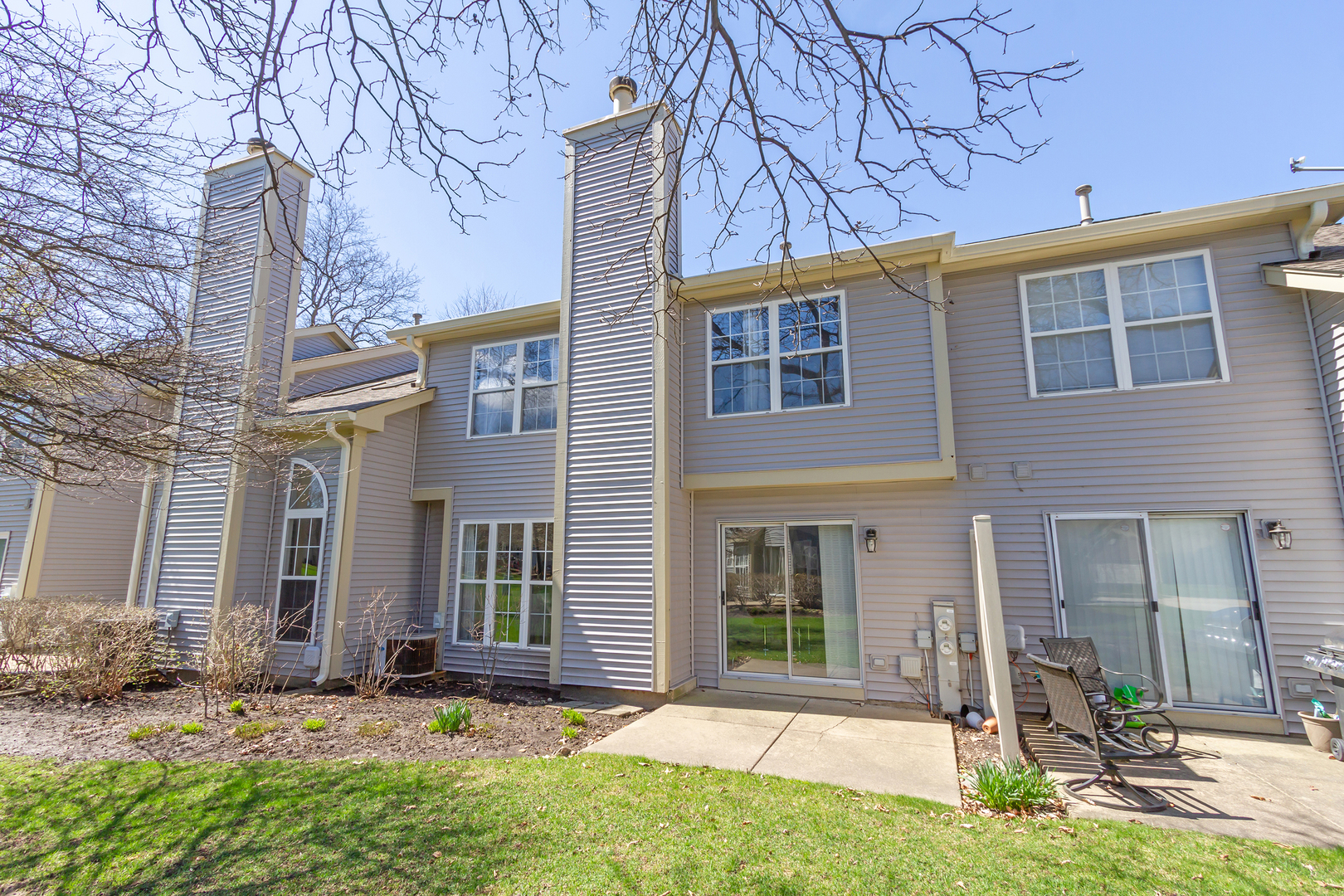 715 Bent Ridge Lane Elgin, IL 60120 - Photo 20 of 20 a front view of a house with a yard