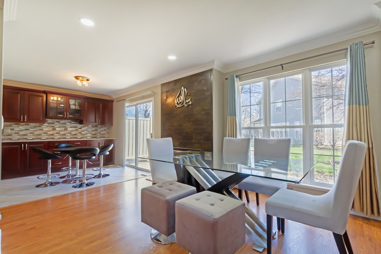 715 Bent Ridge Lane Elgin, IL 60120 - Photo 5 of 20 a living room with furniture a fireplace and a table