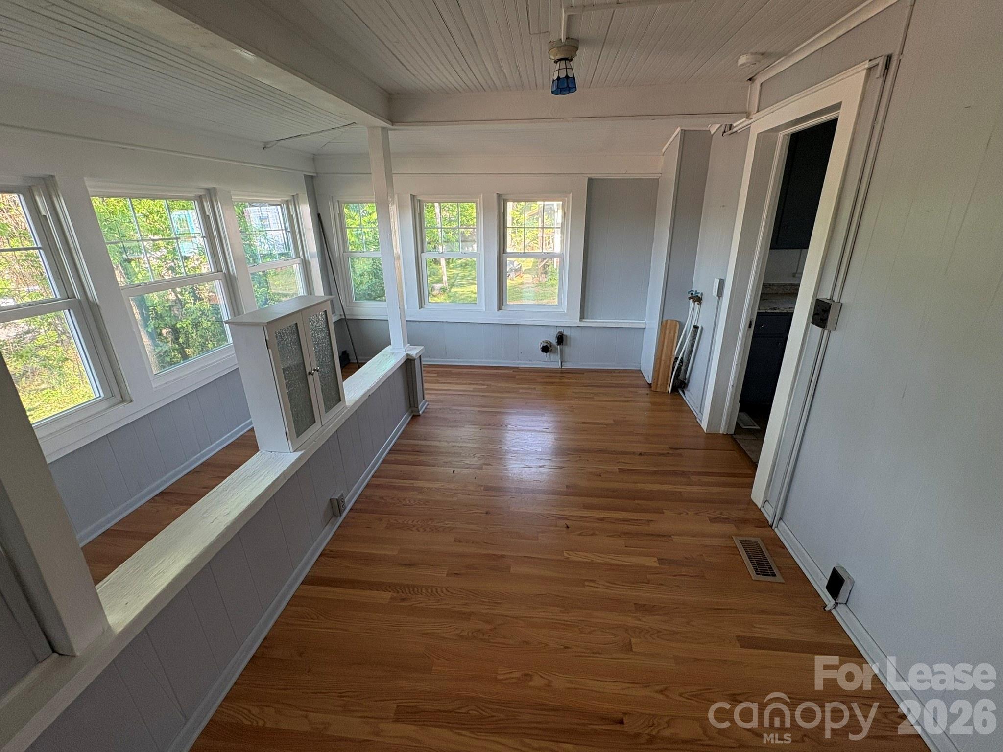 303 Bouchelle Street Morganton, NC 28655 - Photo 8 of 12 a view of entryway and hall with wooden floor